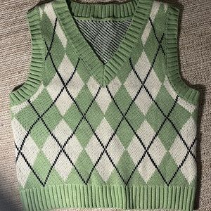 green sweater vest